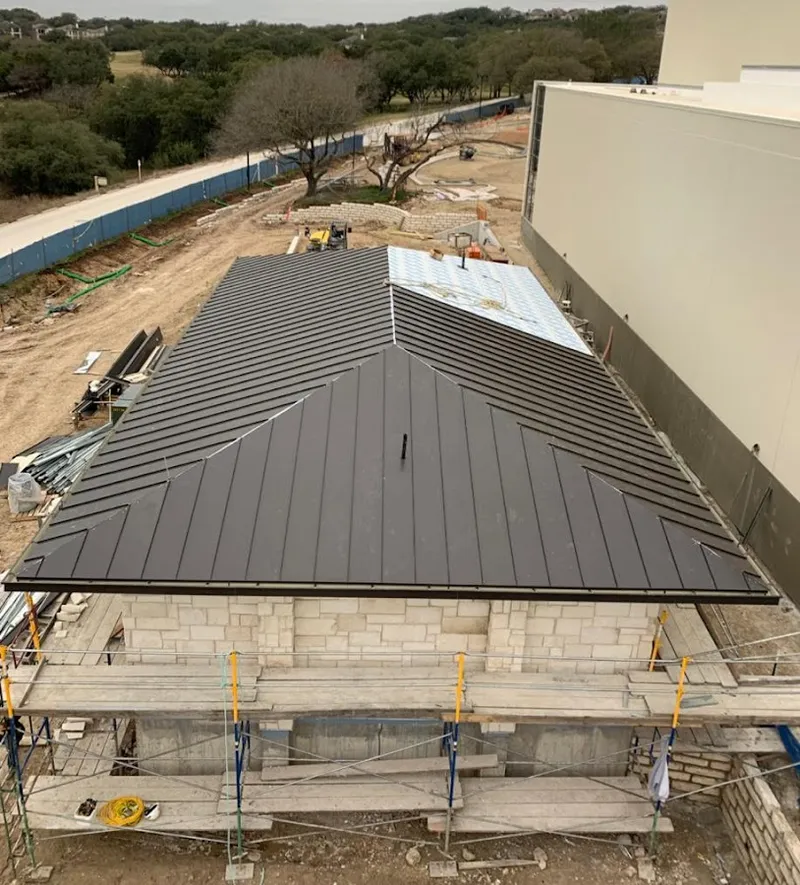 Metal roof new construction with scaffolding in Winter Haven